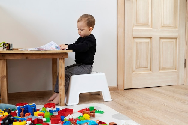 full shot cute kid drawing table 23 2149311272